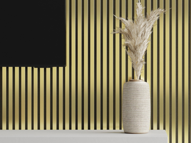 Auksiniai lameliai kambaryje